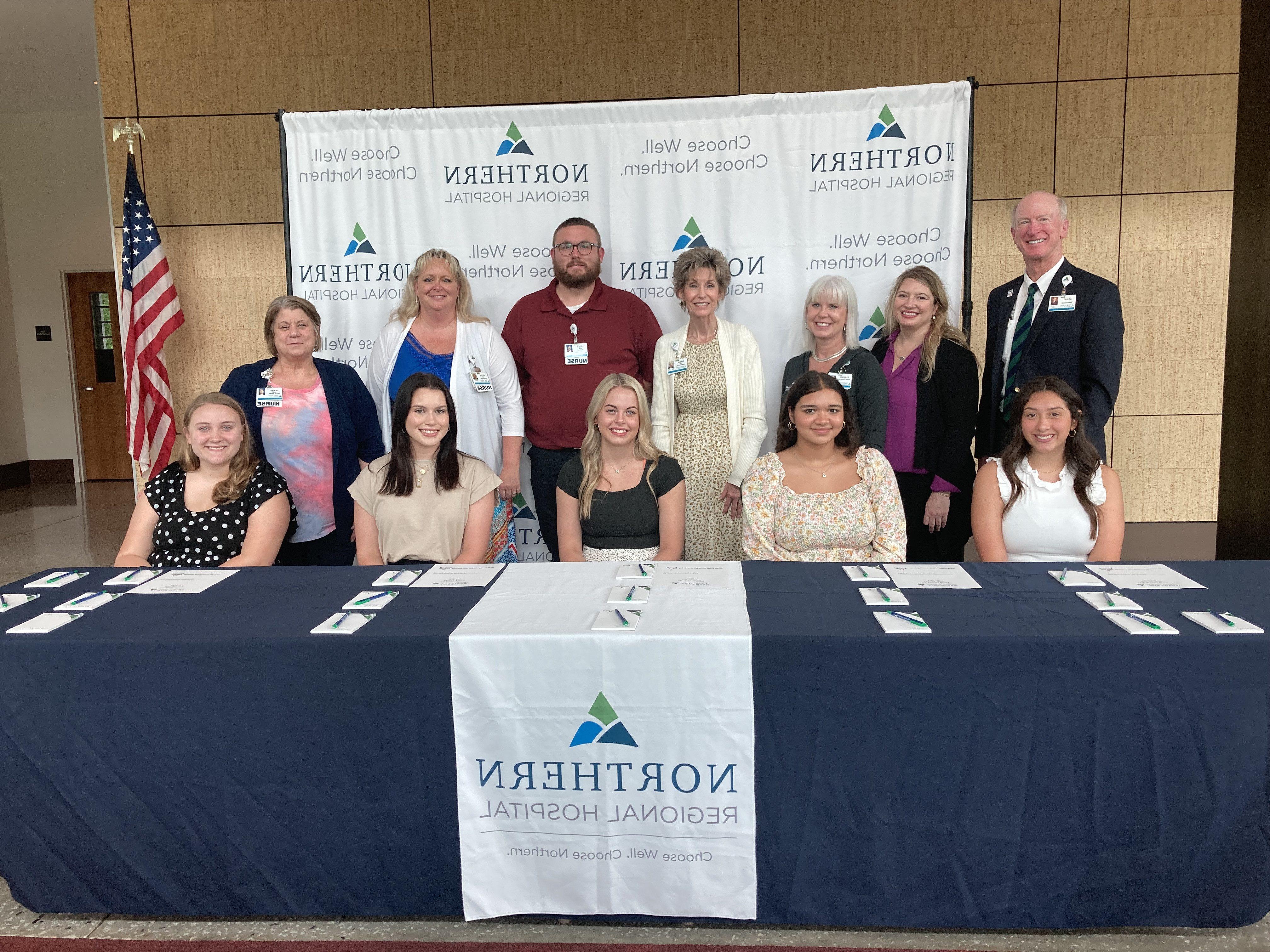 Fourteen Surry-Yadkin Works Interns Sign with  Northern Regional Hospital as Apprentices and PRNs